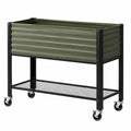 Jardinière surélevée 120 x 60 x 90 cm en acier vert avec roulettes et étagère